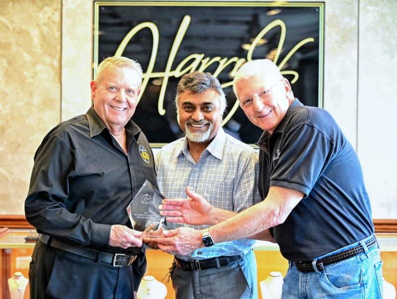 Blue Moon’s second-place tie award presentation attendees are (l-r) Tim Ragan, Harry Keswani and Randy Haney.